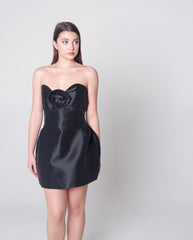 Strapless black satin dress with rose